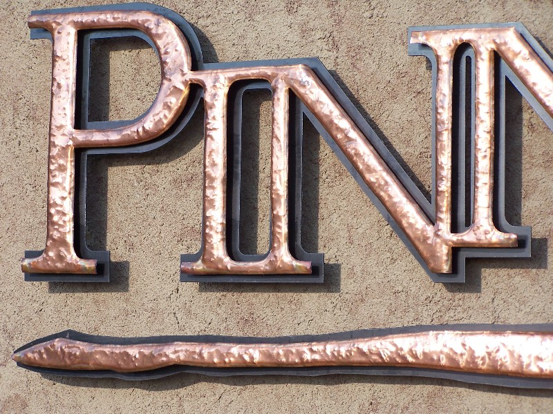 Detailed View of Pinnacle Sign